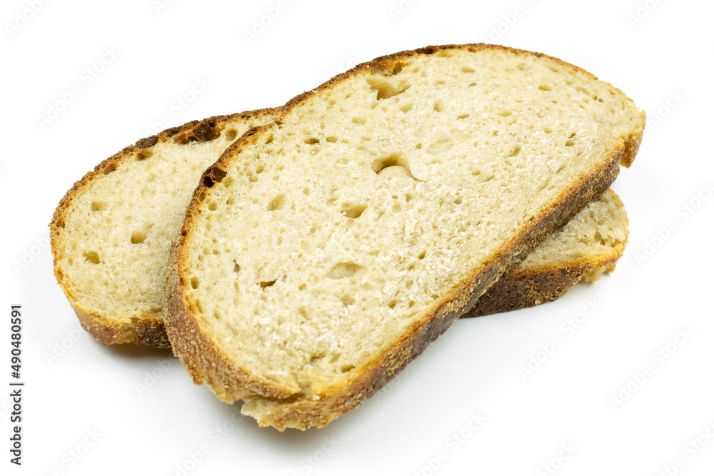 Two sliced slices of round whole-grain bread lie on top of each other on a white isolated background. Healthy lifestyle. The concept of proper nutrition.