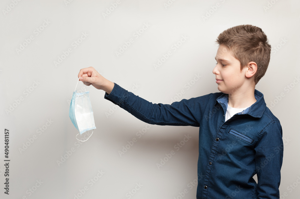 the boy throw out protective medical mask demonstrating complete recovery