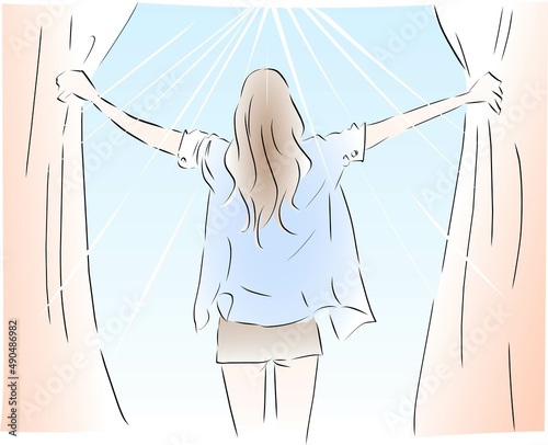 朝起きて朝日を浴びる女性