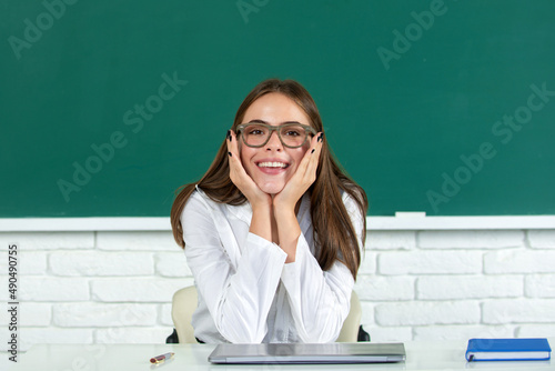 Female student in university, school education, Young woman study in college classroom. Happy school girl. © Volodymyr