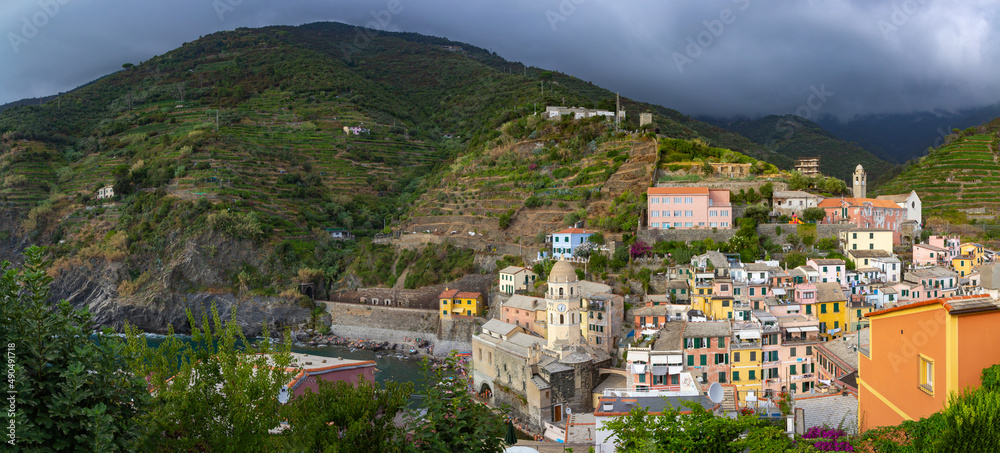 Panoramic aerial view of Vernazza fishing village at sunset, seascape in Cinque Terre National Park, Liguria, Italy, La Spezia province