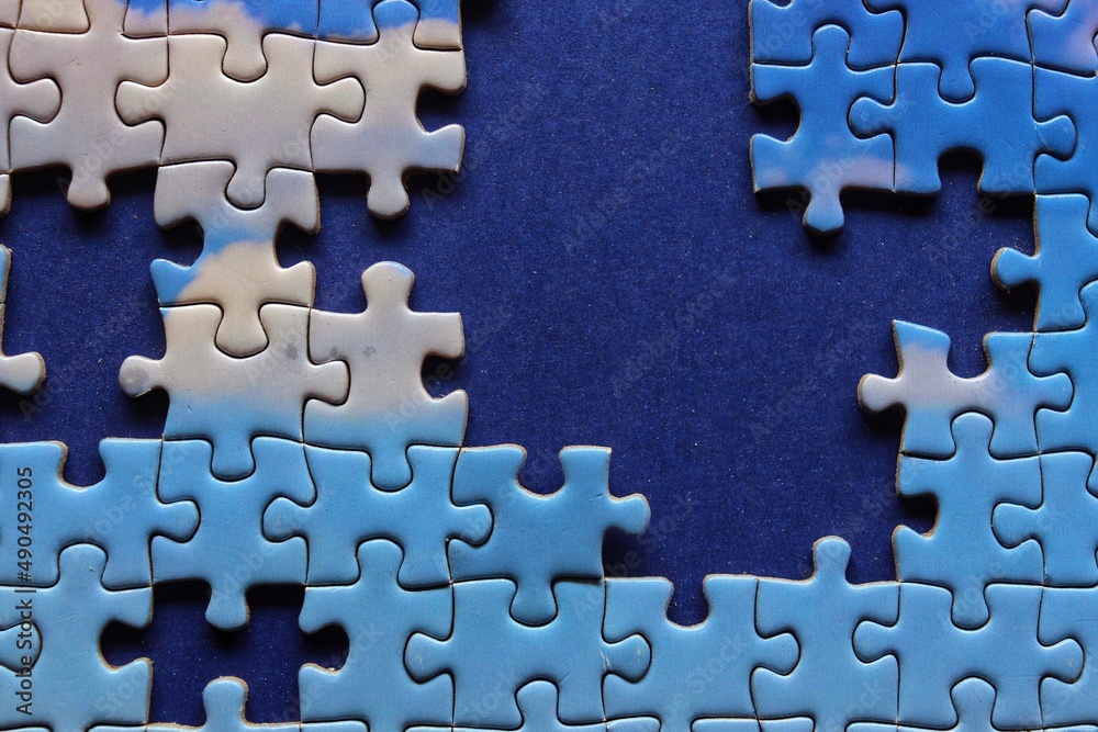 Pieces of Jigsaw puzzle, sky and clouds with blue background Pieces of Jigsaw puzzle, sky and clouds with blue background