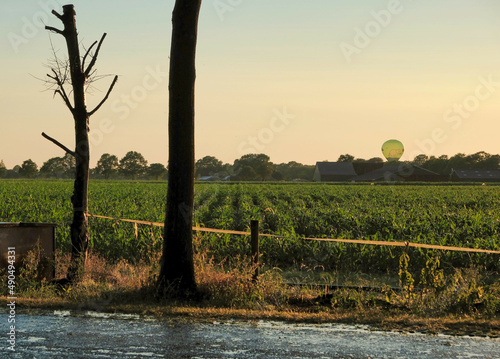 irrigation farm fields sunset hot air balloon water trees