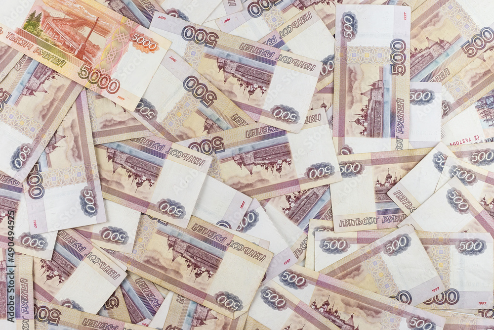 Fototapeta premium Russian ruble. Russian currency closeup in the form of texture.