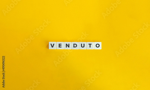 Venduto Word on Letter Tiles on Yellow Background. Minimal Aesthetics.