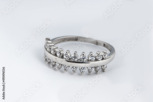 Silver diamond ring isolated on white background. Silver jewelry fashion ring