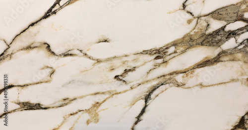 light gray marble tile with abstract pattern