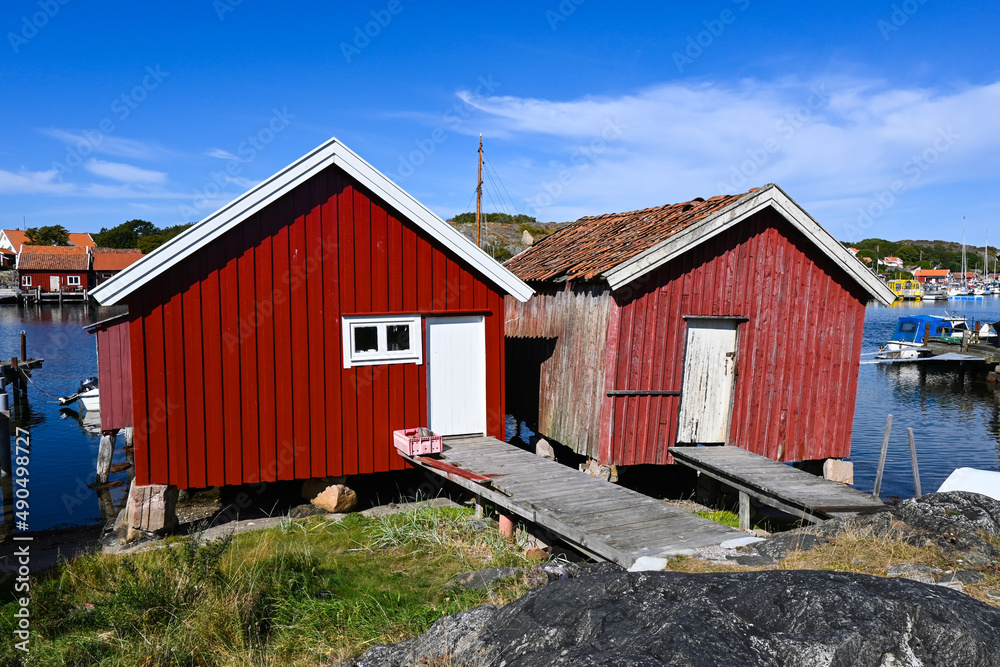 Red traditional Scandinavian houses on the main town of Koster islands in Sweden Red traditional Scandinavian houses on the main town of Koster islands in Sweden