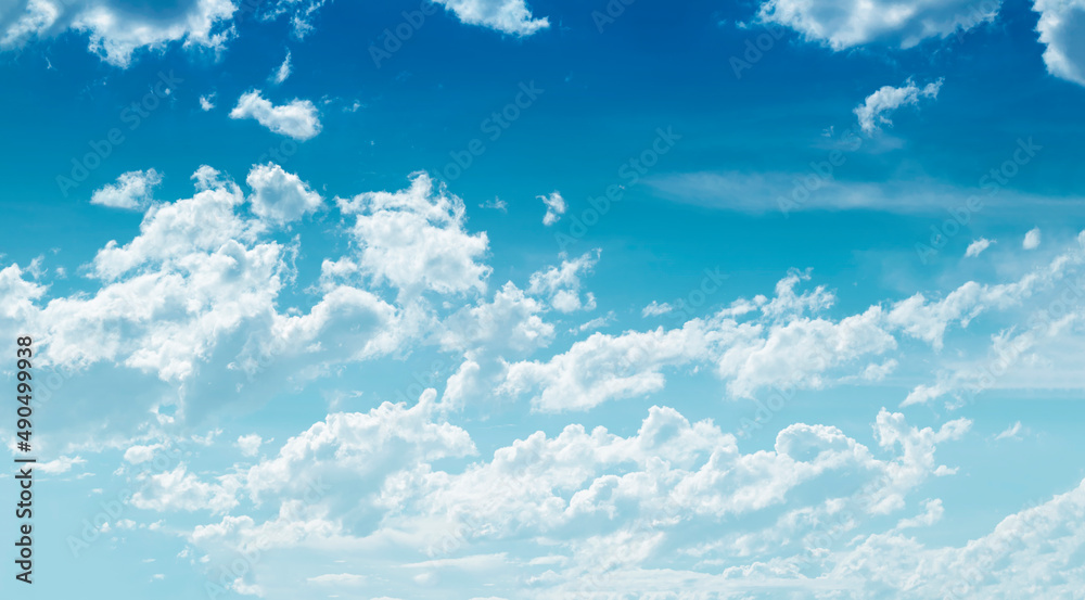 Blue sky with fluffy cloudscape nature background Blue sky with fluffy cloudscape nature background
