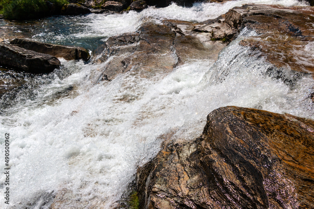 Waterfall Tvindefossen near Voss on the road to Flam (Flom) in Norway Waterfall Tvindefossen near Voss on the road to Flam (Flom) in Norway