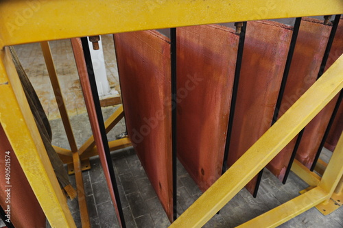 East Kazakhstan region, Kazakhstan - 12.02.2015 : Layers of cathode copper on a special lift for processing. photo