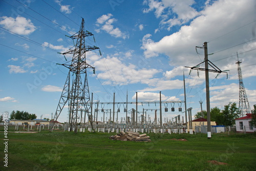 Nur-Sultan, Kazakhstan - 05.28.2015 : High-voltage power lines with insulators, stabilizers and transformers.