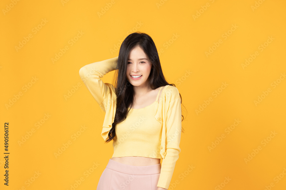 Portrait of beautiful young Asian girl model long hair in casual summer clothes smile, happy and enjoying in studio isolated on white background.