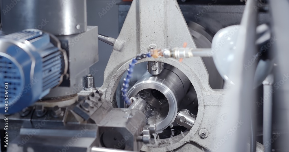 The CNC lath machine,close up to the head stock of CNC lath machine.The CNC turning machine The CNC lath machine,close up to the head stock of CNC lath machine.The CNC turning machine
