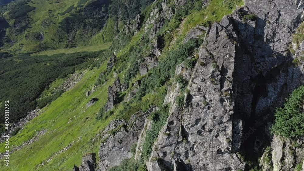 Aerial view of rocky peak of Spitz mountain in the Carpathian mountains, landscape of summer mountains. Aerial view of rocky peak of Spitz mountain in the Carpathian mountains, landscape of summer mountains.
