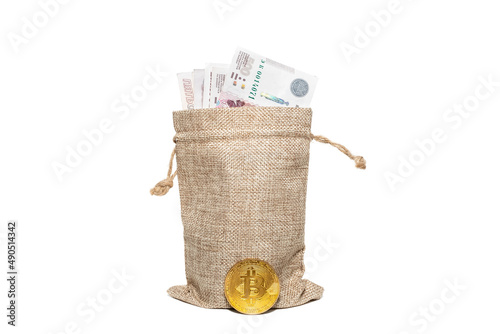 a bag of money and bitcoin isolated on a white background photo