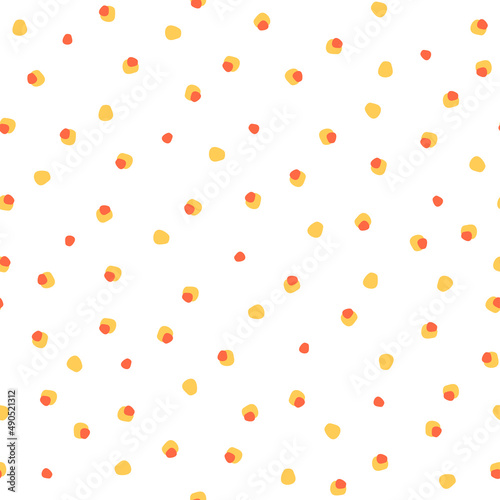 Orange and yellow small dots seamless pattern.