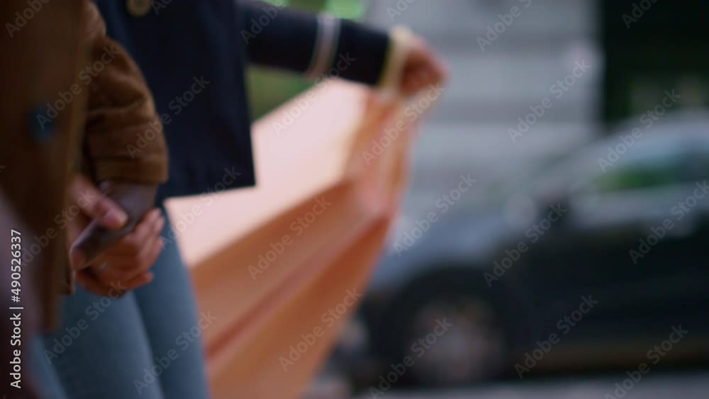 Walking couple holding hands together closeup side view. Family weekend shopping