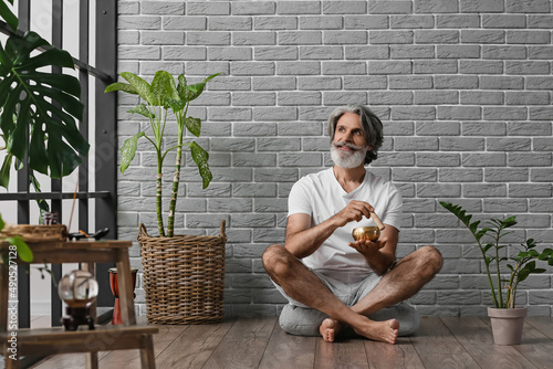 Mature man with Tibetan sin...