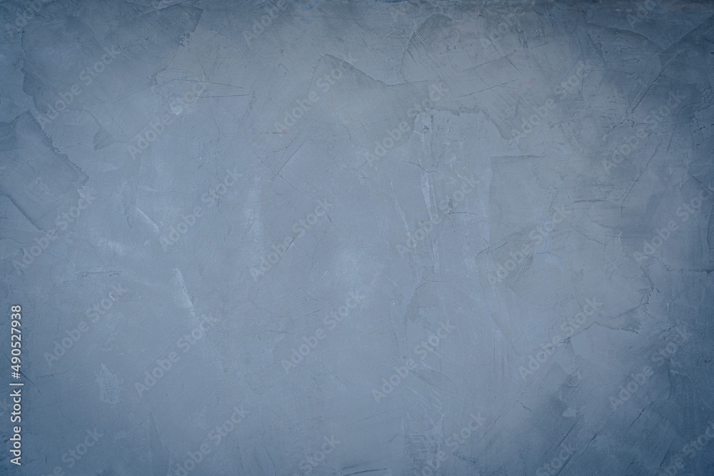 Naklejka premium A grey black wall for inscriptions. Graphite wall. Wall for ads. Blackboard.Decorative loft style.Concrete Wall Texture Background Grey Cement Room free space copy.blue tint.dirt rough non smooth.