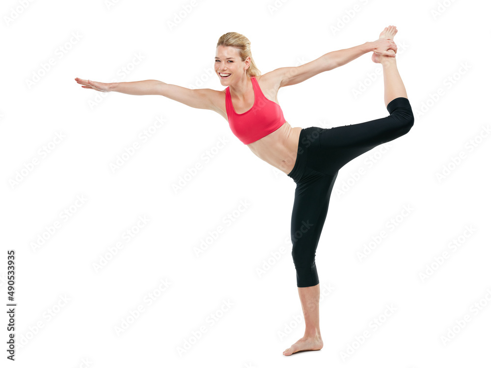 Turn intentions to actions. Studio shot of a young woman doing stretch exercises.