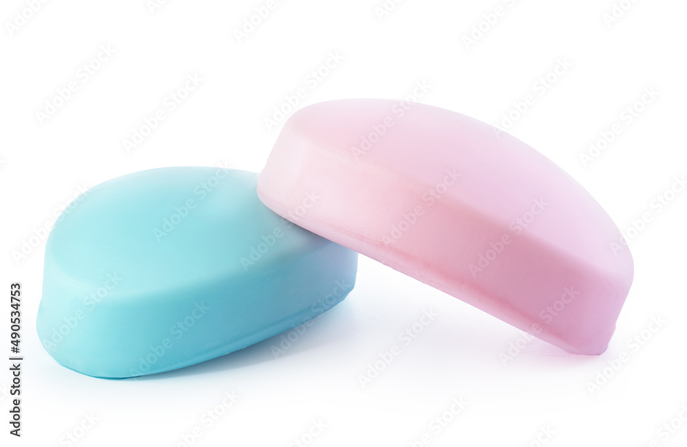 Pink and blue soap bars on white background