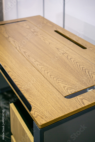 Empty rough wooden table top in the dark room