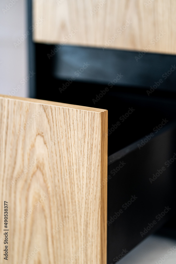 Opened drawer cabinet furniture wooden table at workplace Opened drawer cabinet furniture wooden table at workplace