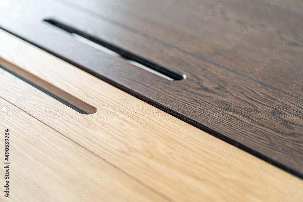 Empty rough wooden table top in the dark room Empty rough wooden table top in the dark room