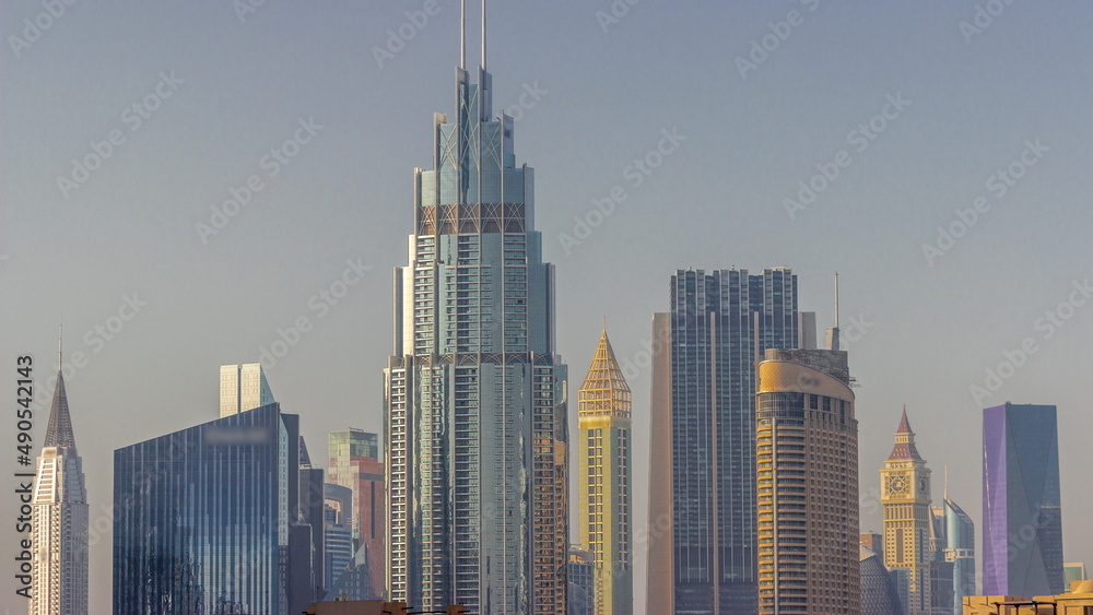 Row of the tall buildings around Sheikh Zayed Road and DIFC district aerial timelapse in Dubai