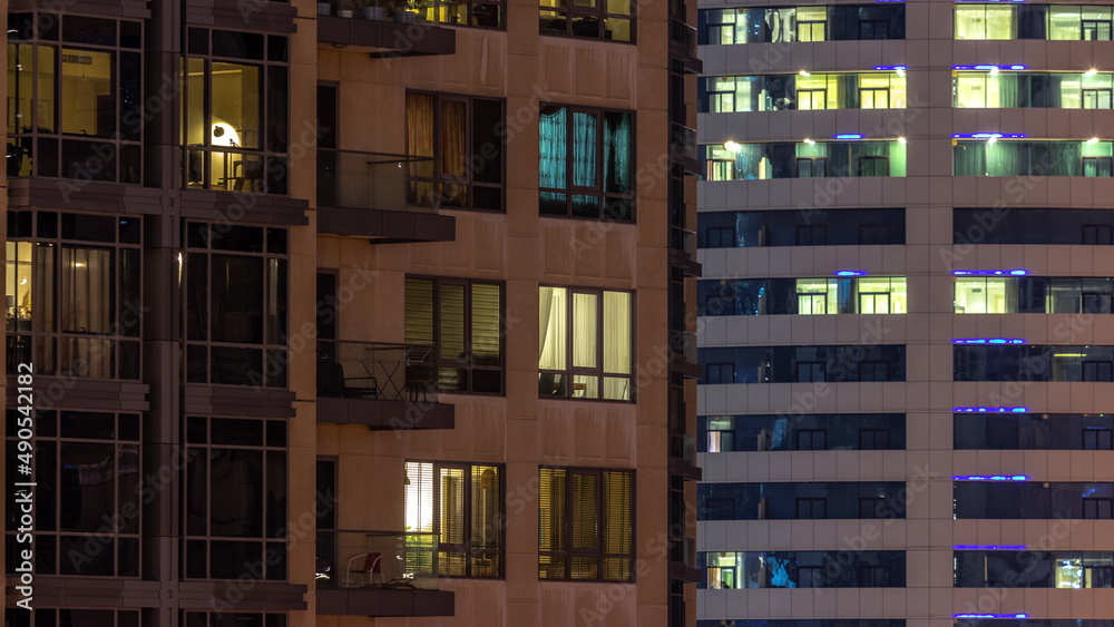 Full of the light window in the skyscrapers at night in the modern city timelapse Full of the light window in the skyscrapers at night in the modern city timelapse