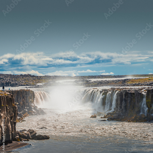 Wonderful waterfall Selfoss in Iceland, summer with copy space gradient background.
