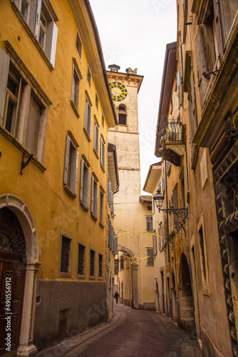 A clock tower gate - the Torre Civica or Civic Tower - in the historic centre of Rovereto in Trentino, north east Italy 