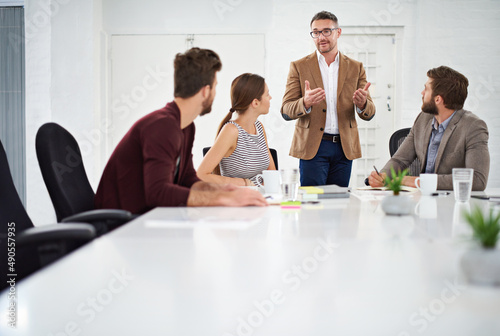 The best ideas come as a team. Shot of a group of businesspeople in the boardroom.