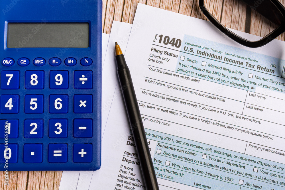 Tax forms 1040. U.S Individual Income Tax Return on a desk. Tax concept Tax forms 1040. U.S Individual Income Tax Return on a desk. Tax concept