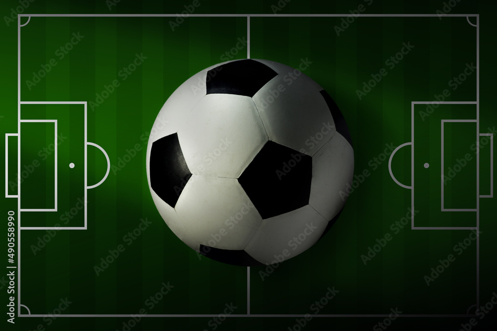top view of a soccer ball and football field in a green vector field top view of a soccer ball and football field in a green vector field