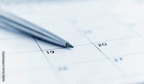 Closeup of pen on calendar © xy