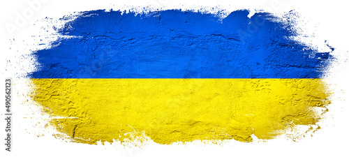 Abstract brushstroke paint brush splash in the colors of the flag of Ukraine, isolated on white background.. photo