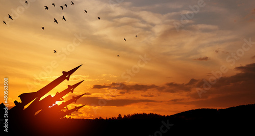 Fotografia The missiles are aimed at the sky at sunset