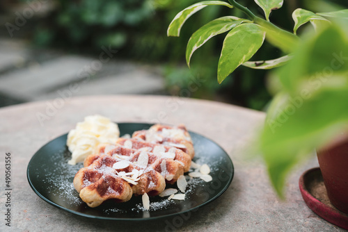 sweet waffle dessert on caf...