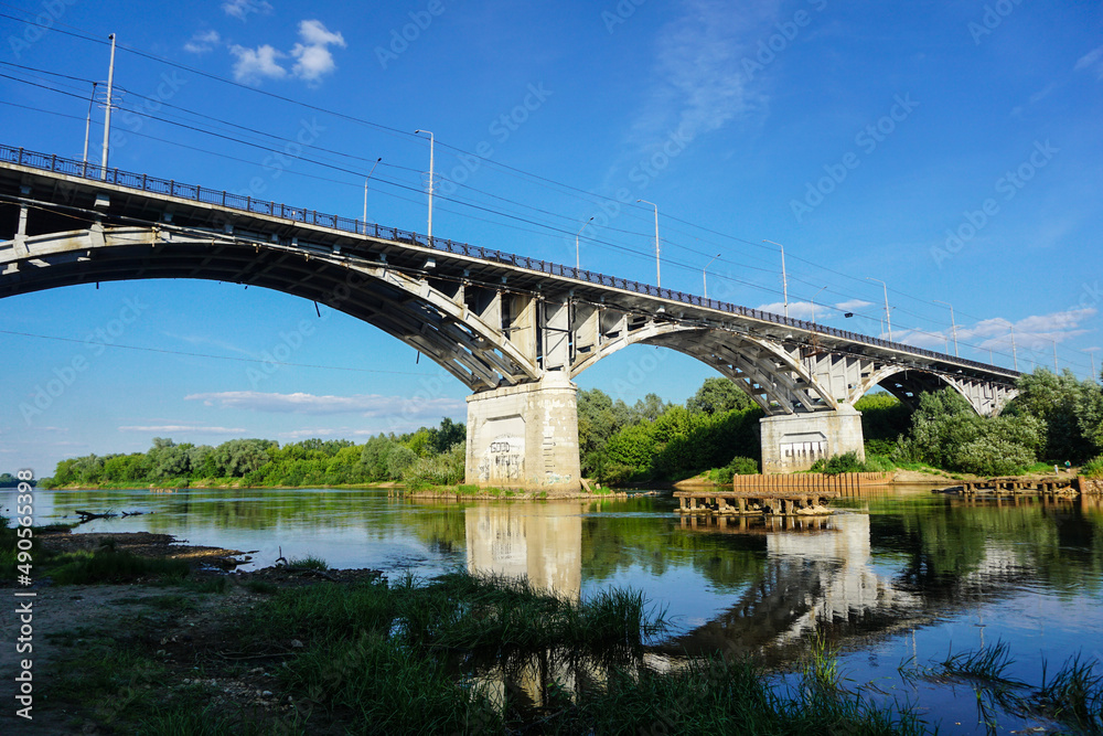The old bridge across Klyazma river in Vladimir city. Sunny summer day with the clear sky.