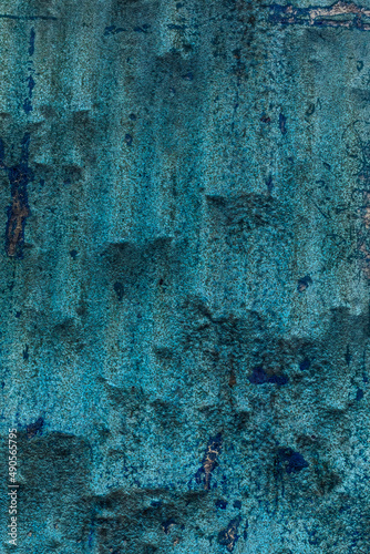 Rugged old cyan color stone surface for texture background
