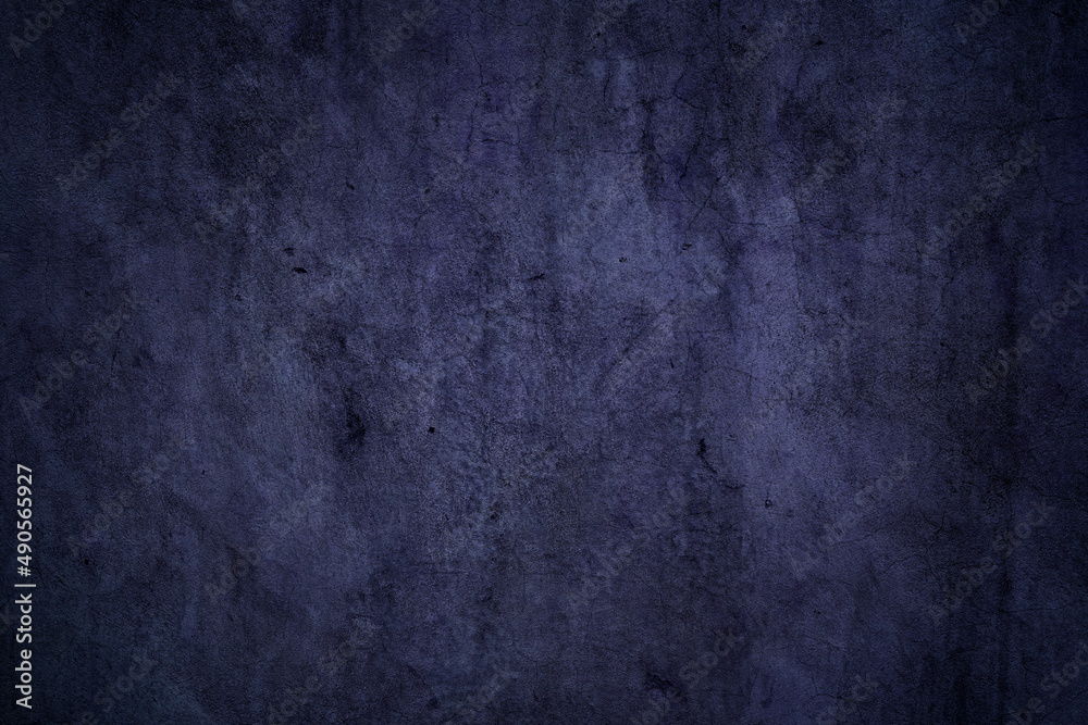 Grunge textured dark purple concrete wall surface for background