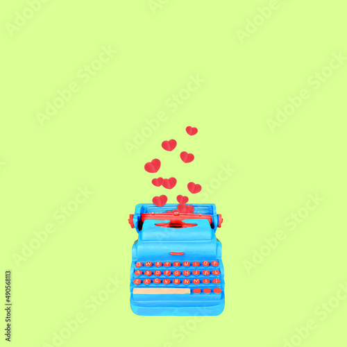 Typewriter keys keytops old style making lovely words of love hearts. Creative literature poetry or nice loving words concept. Trendy pastel colors photo