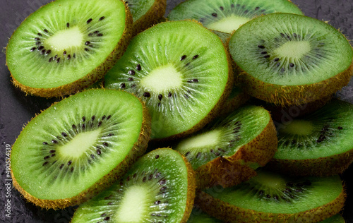 Bunch of fresh juicy slices kiwi fruit