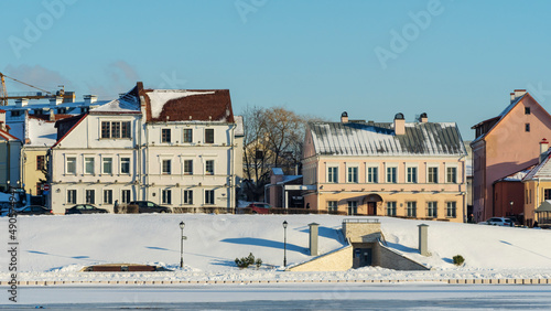 Panoramic view of old building in historical center of Minsk. Historical building near the frozen river.