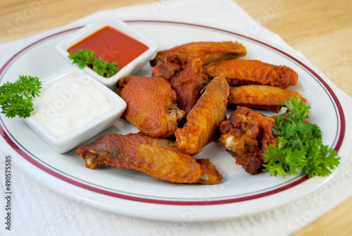 Spicy Deep Fried Buffalo Wings Served with Hot Sauce and Blue Cheese Dressing