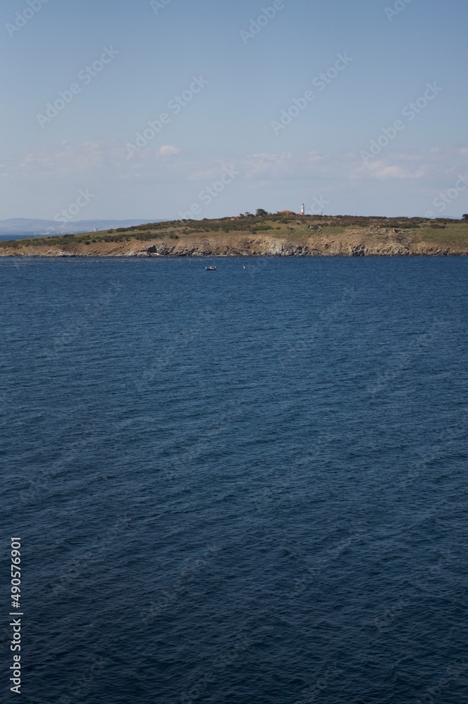 Seaside Cape with Small Lighthouse Seaside Cape with Small Lighthouse
