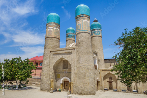 Chor-Minor Madrassa, one of the main architectural symbols of Bukhara, Uzbekistan. Structure was built in 1805. Although this is a madrasah, it was built in a completely unique style photo