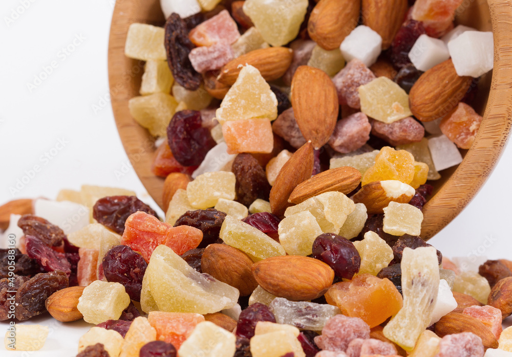 Dried fruits and nuts in a bambus bowl. Dried fruits and nuts in a bambus bowl.
